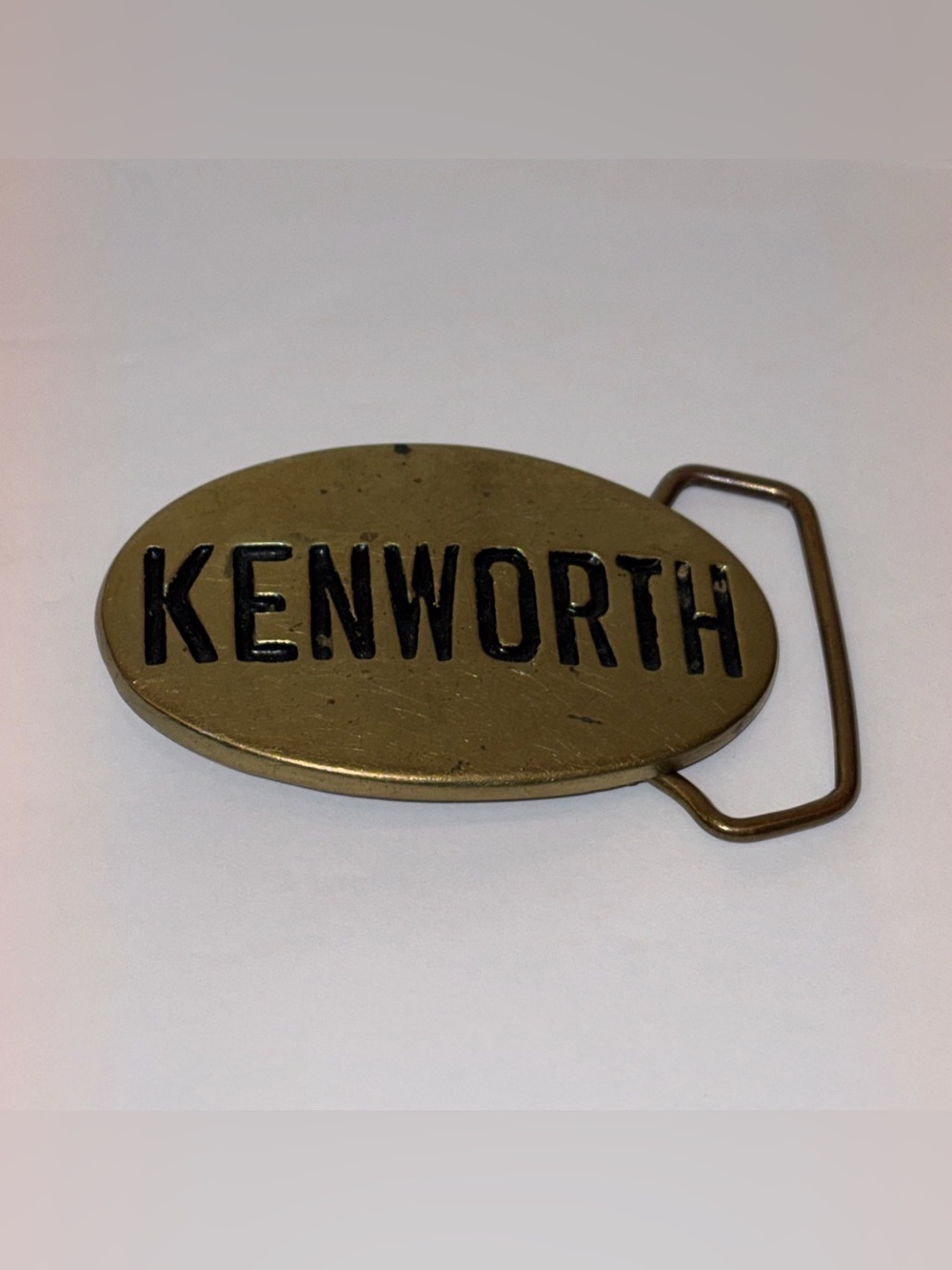 Kenworth Brass Oval Belt Buckle - Brass with Black Lettering